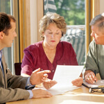 Senior couple meeting with agent