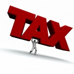 iStock_000002998026Small Man Carrying TAXES