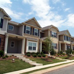 A row of new townhouses or condominiums.